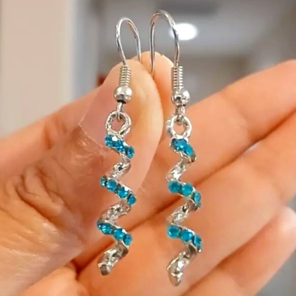 Silver tone earrings blue stones